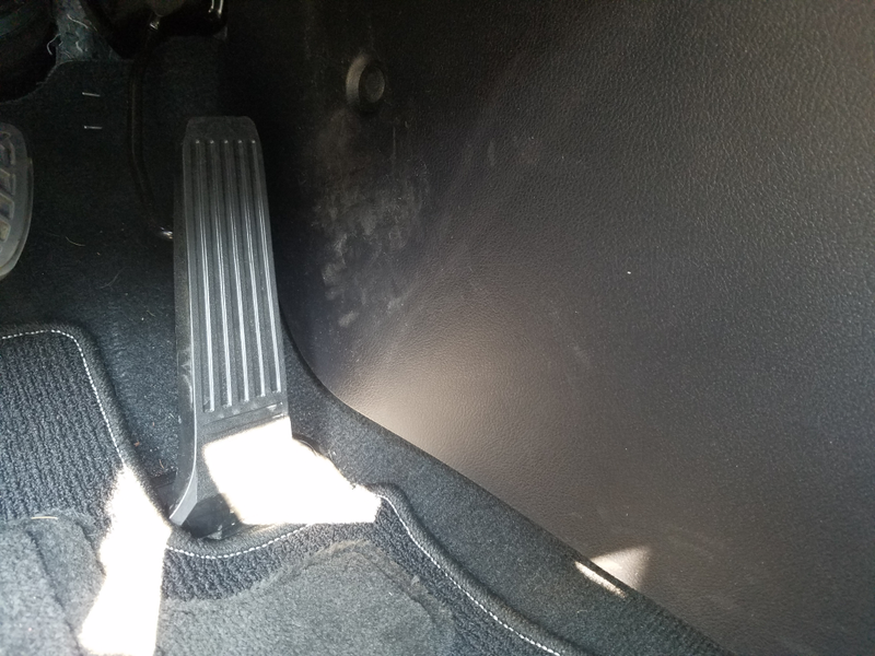 Here’s the Toyota part: this cheap flimsy plastic around the transmission tunnel in the footwell.